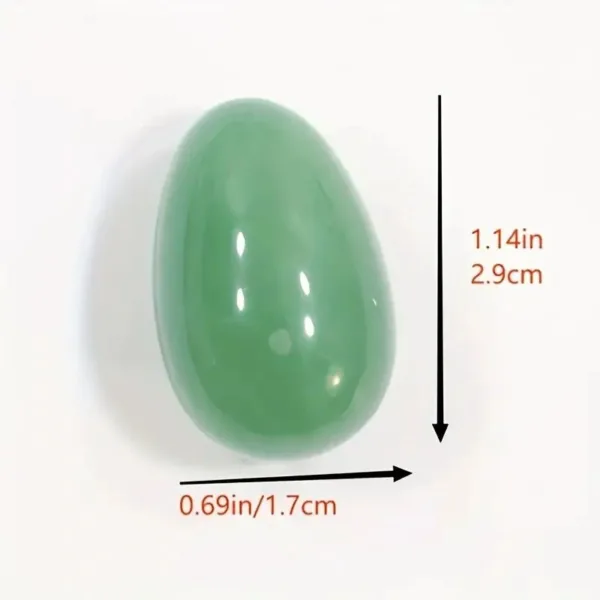 Green gemstone egg for healing and meditation.