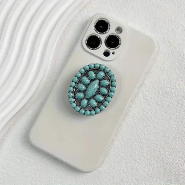 White phone case with turquoise ring holder.