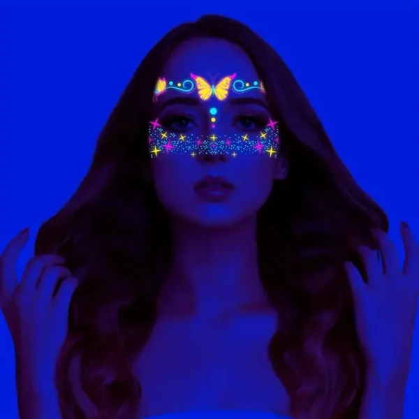 Woman with glowing butterfly and star makeup.