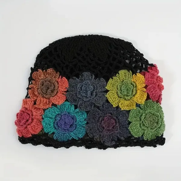 Black crochet hat with colorful flowers.