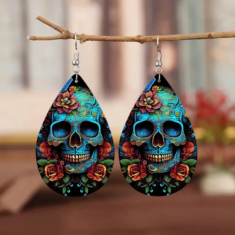 Floral blue skull drop earrings.