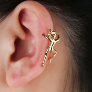 Gold ear cuff with a climbing figure.