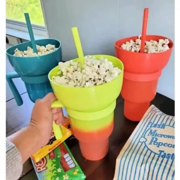 Three popcorn cups with popcorn inside.