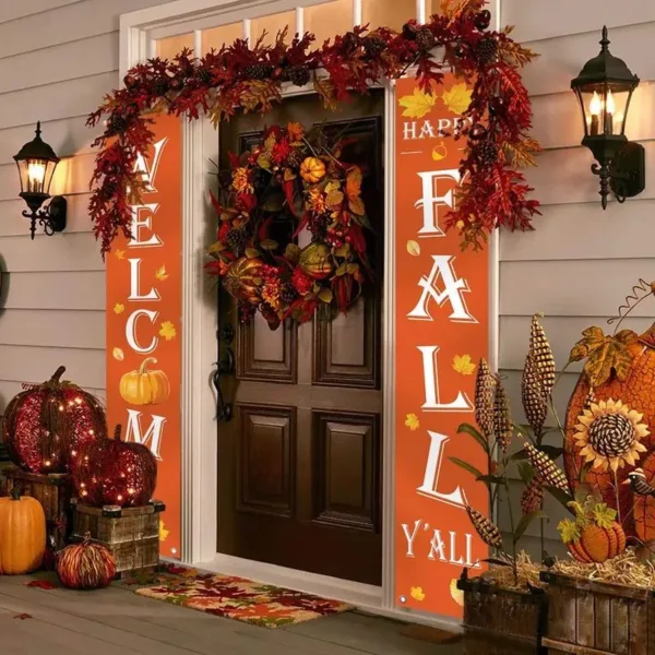 Fall welcome door decorations with pumpkins.