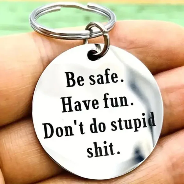 Keychain with "be safe, have fun" message.