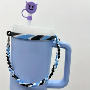 Blue and black beaded handle on a cup.