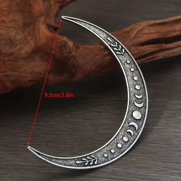 Silver crescent moon necklace with phases.