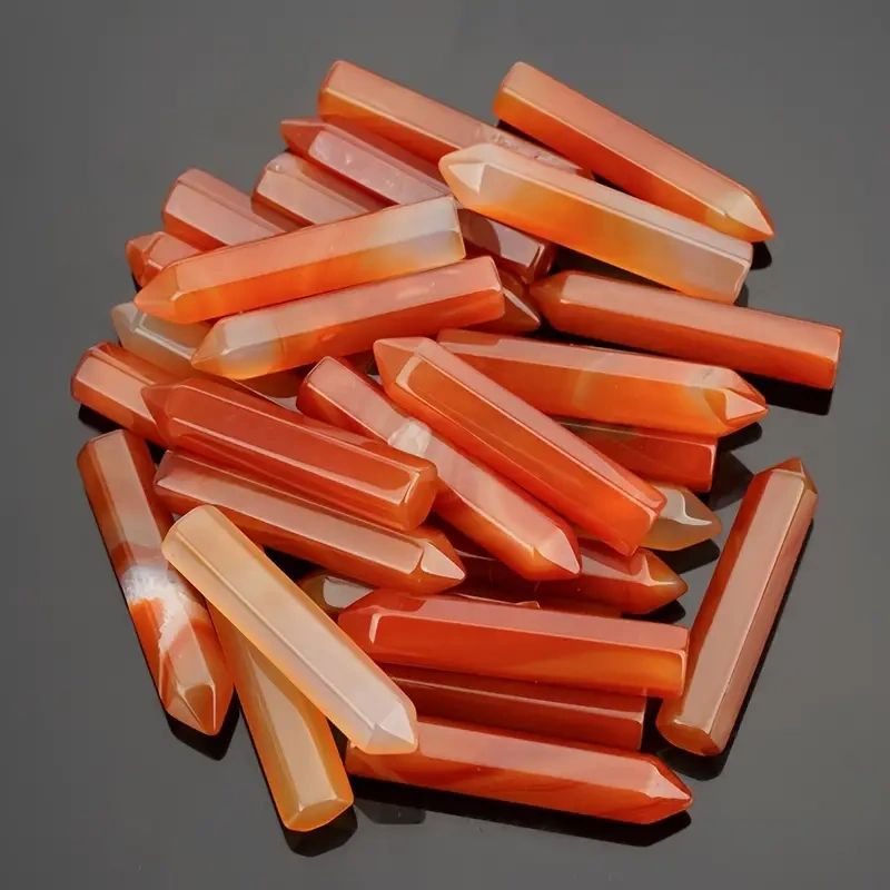 Collection of red carnelian crystal wands.