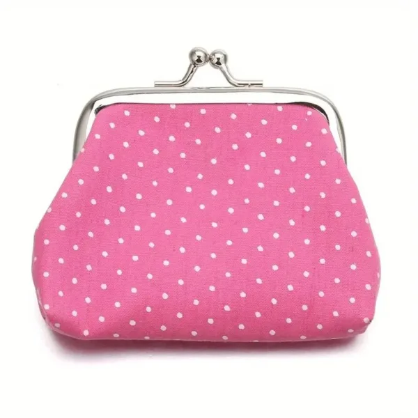 Pink polka dot coin purse with clasp.