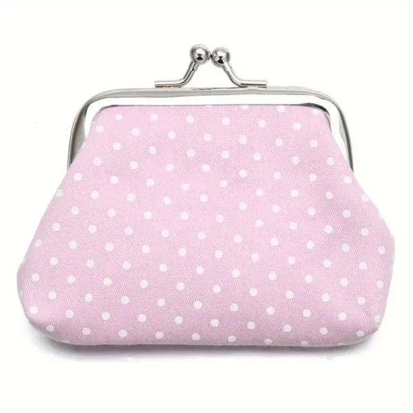 Pink polka dot coin purse with clasp.