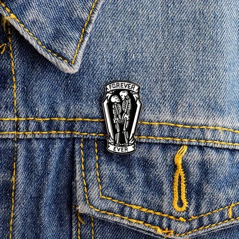 Skeleton couple forever ever pin on denim.