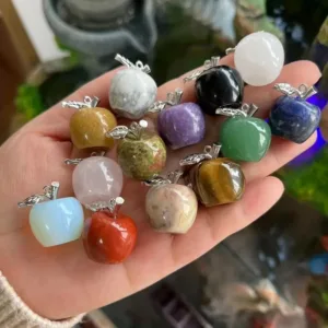 Assortment of crystal apple charms.