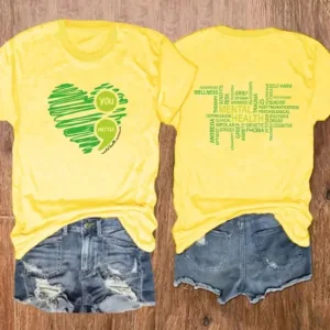 Yellow t-shirt with green heart and "you matter" text.