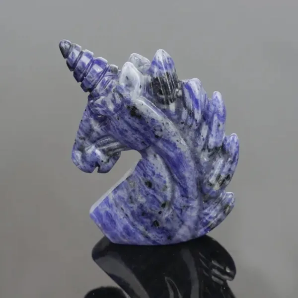 Blue gemstone unicorn carving.