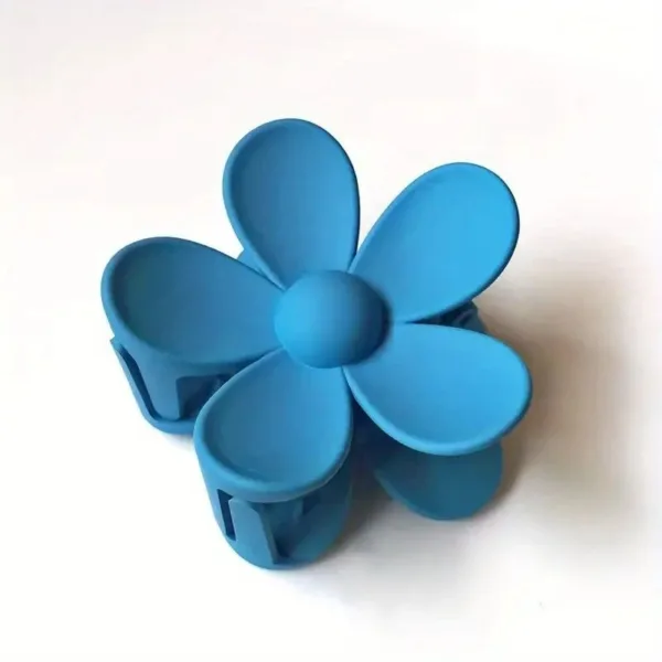 Blue plastic flower hair clip.