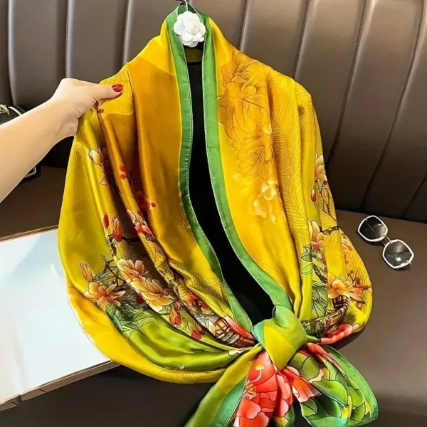 Yellow and green silk scarf with floral print.