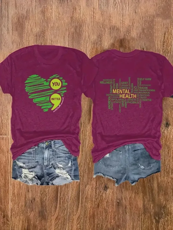 Burgundy t-shirt with green heart and mental health text.