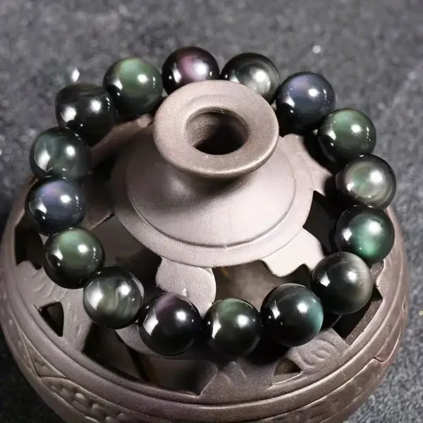 Black obsidian gemstone bead bracelet.