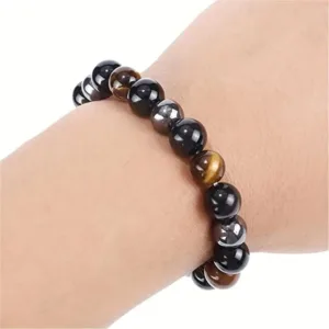 Black, brown, and gold beaded bracelet.