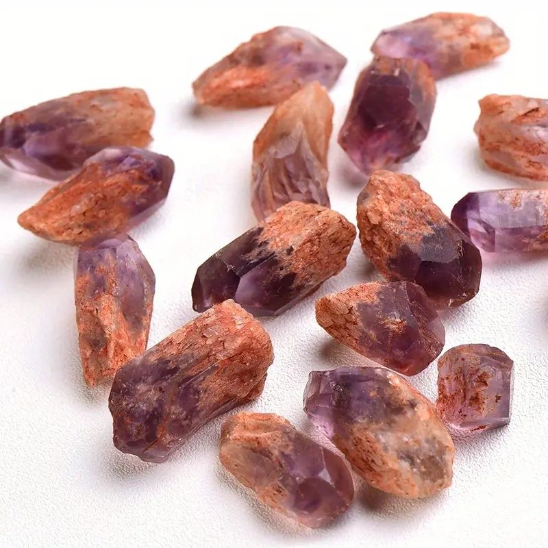 Purple and orange amethyst crystal points.