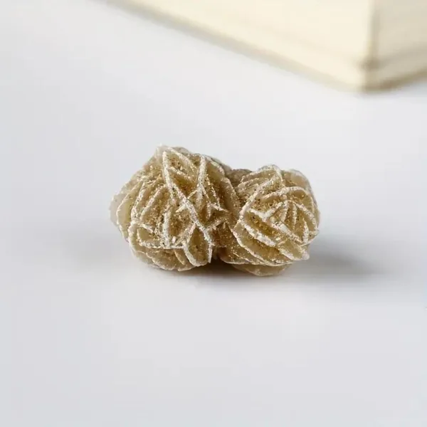 Desert rose stone on white background.