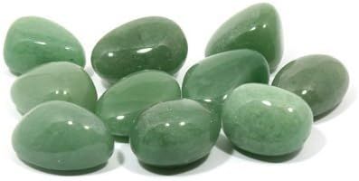 Green tumbled stones for crystal healing.