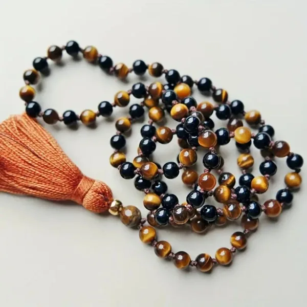 Tiger's eye and onyx beaded mala necklace.