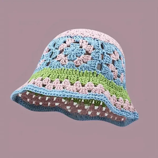 Crocheted bucket hat in blue, green, and pink.