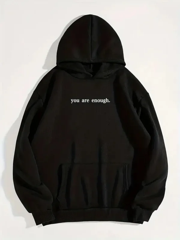 Black hoodie with "You are enough" text.