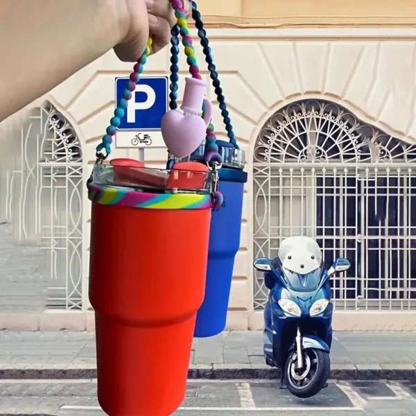 Two colorful tumblers with a handle.