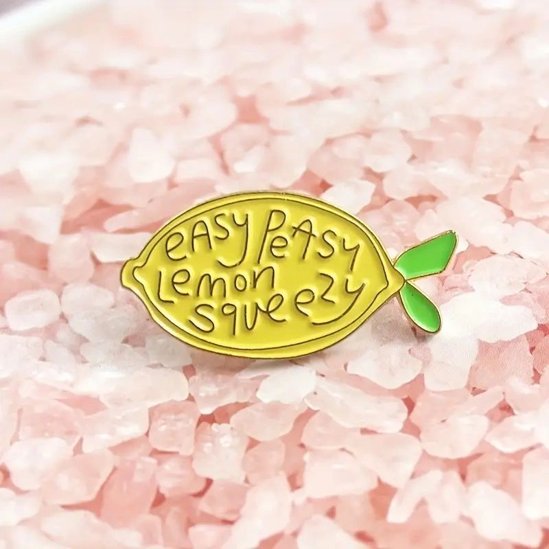 Yellow lemon pin with text "easy peasy lemon squeezy"