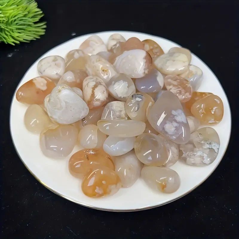 White and brown agate stones on a plate.