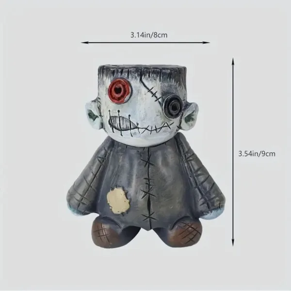 Stitched doll figurine with one eye.