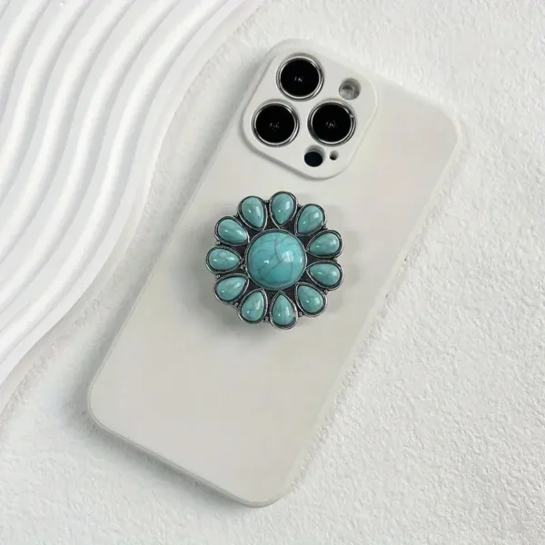 White phone case with turquoise ring holder.