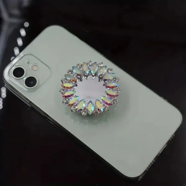 Diamond phone ring on a white phone.