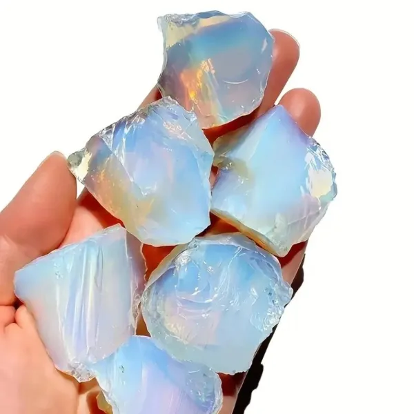 Handful of iridescent opal stones.