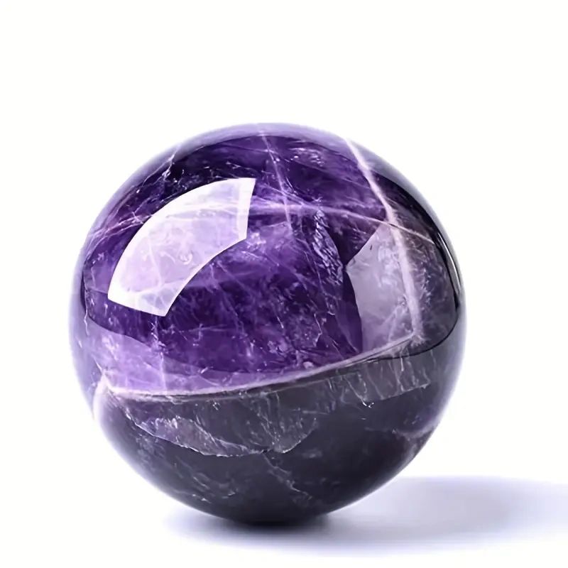 Purple amethyst gemstone sphere.