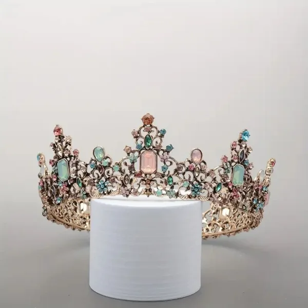 Gold jeweled crown with pink stones.