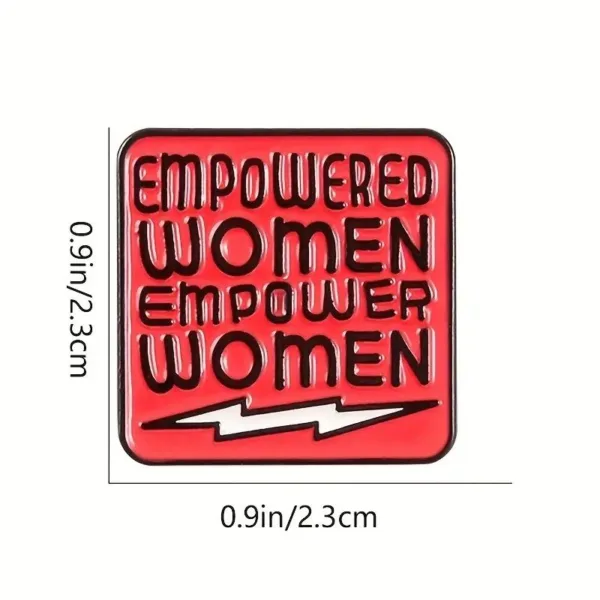 Red square pin with empowered women text.