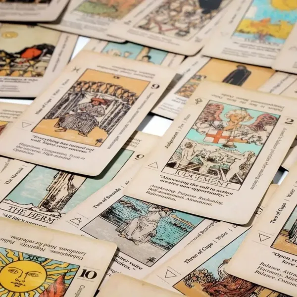 Tarot cards spread out on a table.