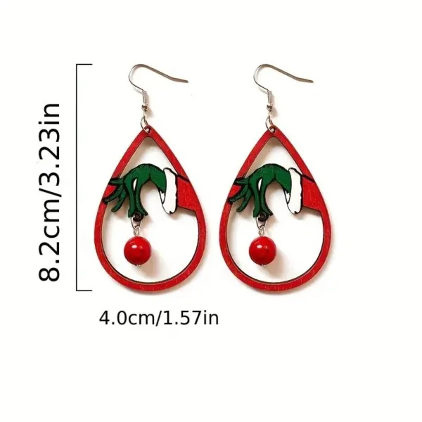 Grinch hand wooden teardrop earrings.