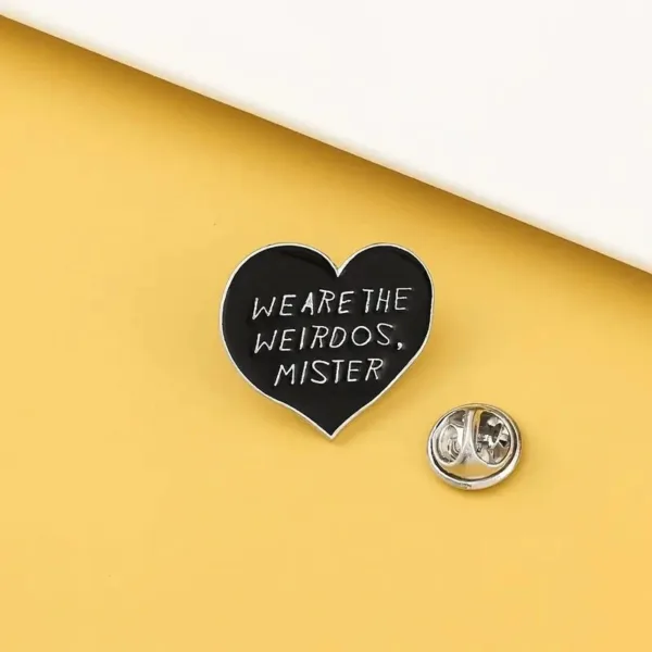 Black heart pin, "We are the weirdos, mister"