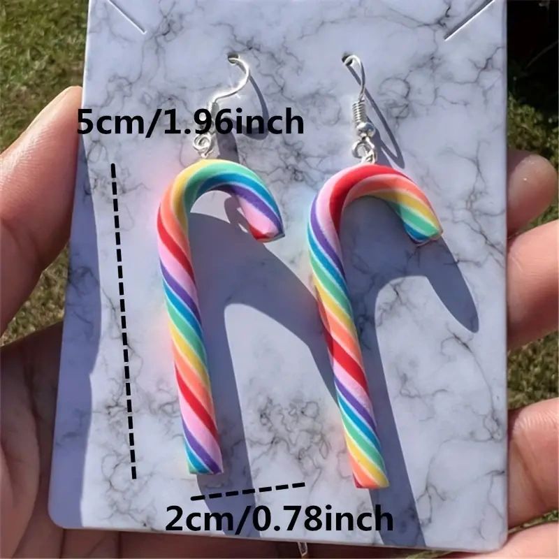 Rainbow candy cane dangle earrings.