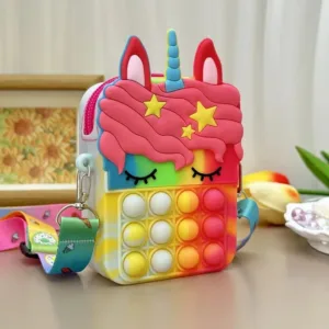 Rainbow unicorn pop it purse with stars.