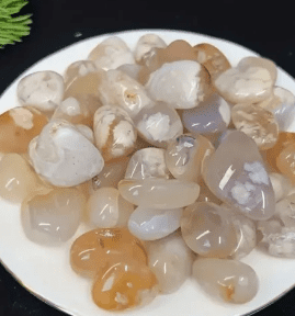 A pile of white and brown agate stones.