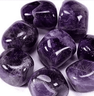 A collection of smooth purple amethyst stones.