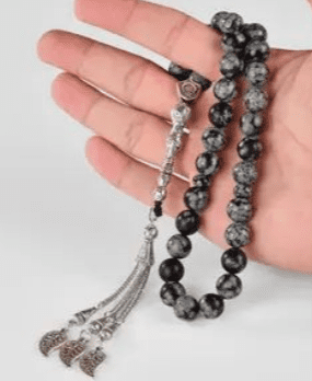 Black and grey stone prayer beads.