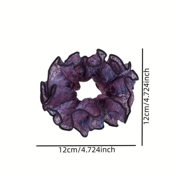 Purple ruffled hair scrunchie with black trim.