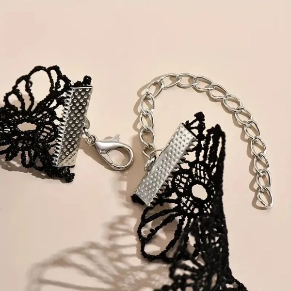 Black lace choker with silver clasps.