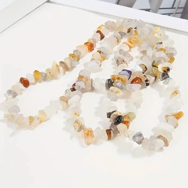 White and multi-colored chip gemstone necklace.